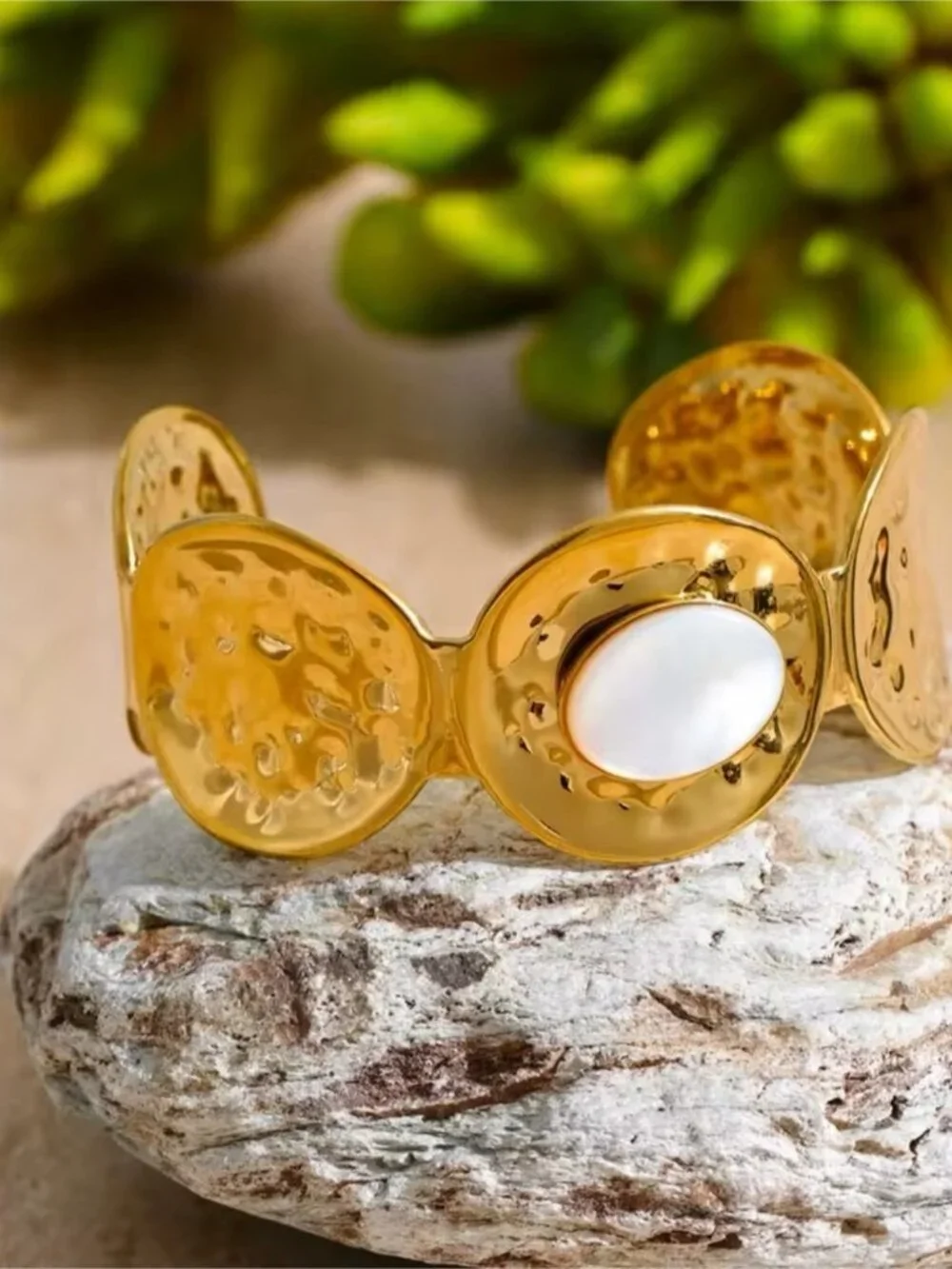 Gold Tone Cuff Bracelet with White Mother-of-Pearl Center